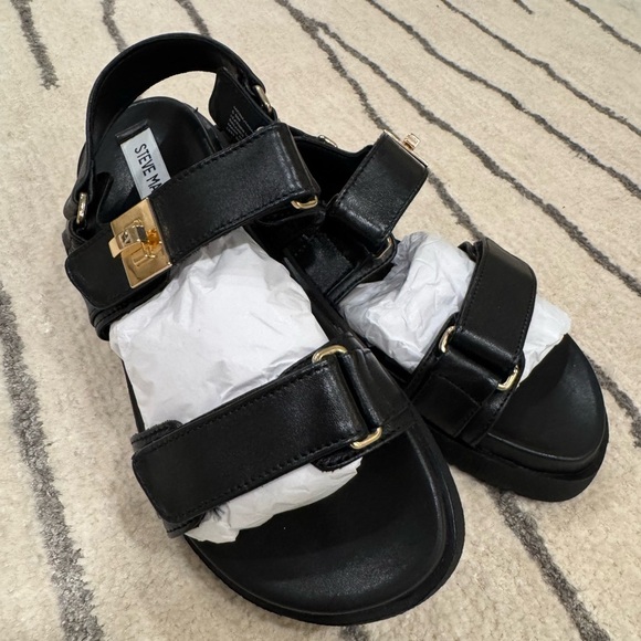 Steve Madden Shoes - Brand new -Steve Madden women’s  Black Sandals with Gold Accents
